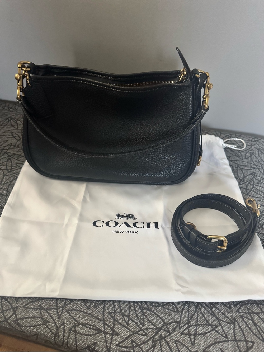 Coach Black Pebbled Leather Cary shoulder Bag with Removable Straps.